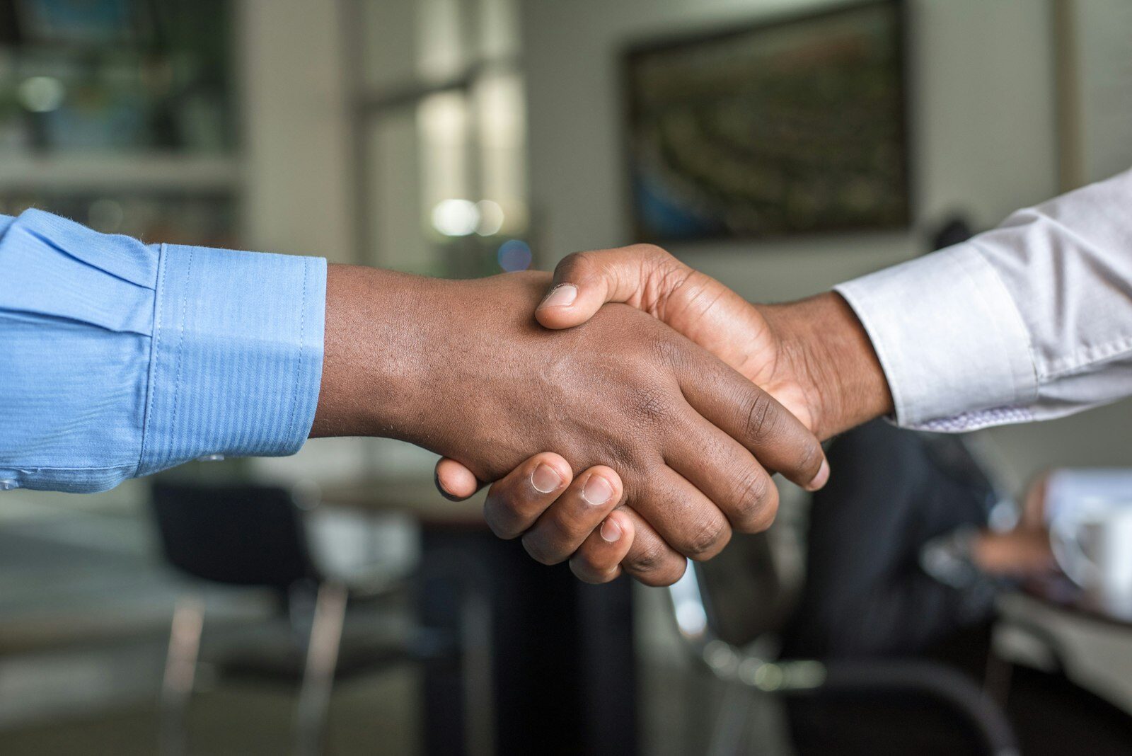 A welcoming handshake — we work with your insurance to make psychiatric care accessible in West Virginia